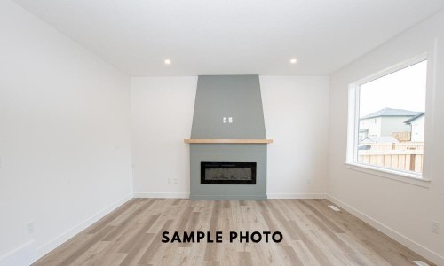 10518 131 Avenue, Grande Prairie, AB - Indoor Photo Showing Living Room With Fireplace