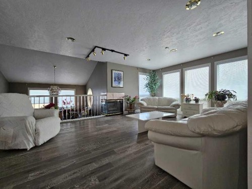 17423 Highway 2, High Prairie, AB - Indoor Photo Showing Living Room With Fireplace