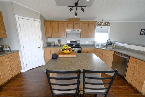 9509 109 Avenue, Clairmont, AB - Indoor Photo Showing Kitchen With Double Sink