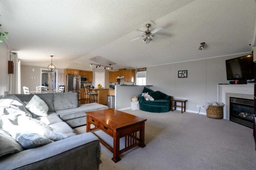 9509 109 Avenue, Clairmont, AB - Indoor Photo Showing Living Room With Fireplace