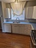 707 3 Avenue, Beaverlodge, AB  - Indoor Photo Showing Kitchen With Double Sink 
