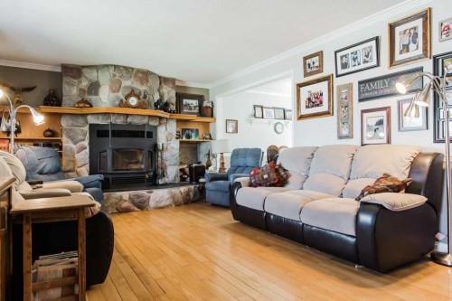 9915 101 Avenue, Clairmont, AB - Indoor Photo Showing Living Room With Fireplace