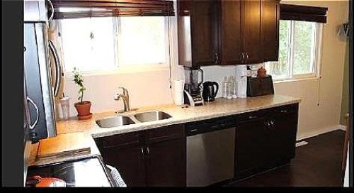 9523 89 Avenue, Peace River, AB - Indoor Photo Showing Kitchen With Double Sink