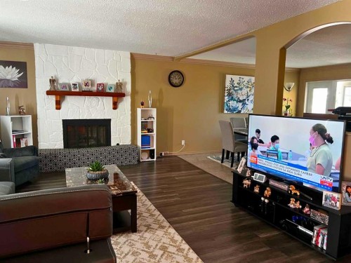 5404 46 Street, Valleyview, AB - Indoor Photo Showing Living Room With Fireplace