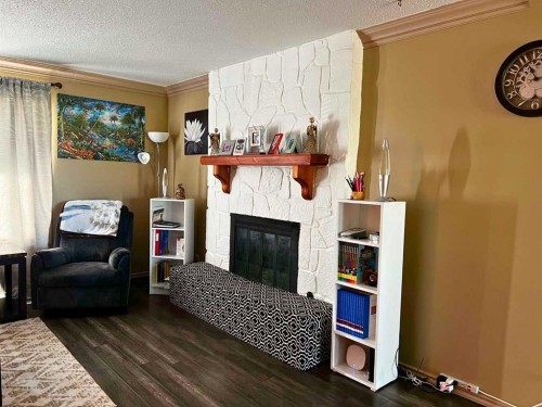 5404 46 Street, Valleyview, AB - Indoor Photo Showing Living Room With Fireplace