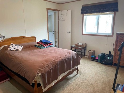 10305 101 Street, Fairview, AB - Indoor Photo Showing Bedroom