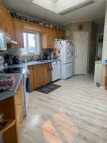 70104 230 Range Road, Valleyview, AB - Indoor Photo Showing Kitchen With Double Sink