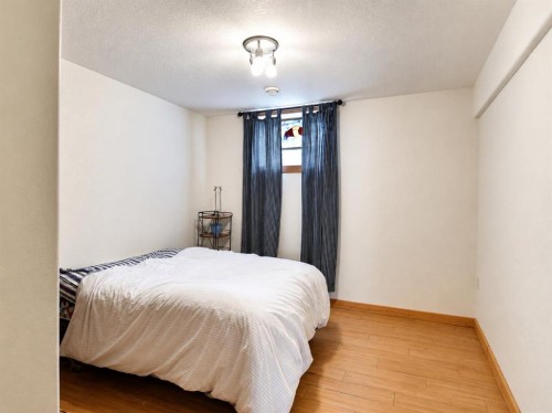 14-71332 Range Road 262, Ridgevalley, AB - Indoor Photo Showing Bedroom