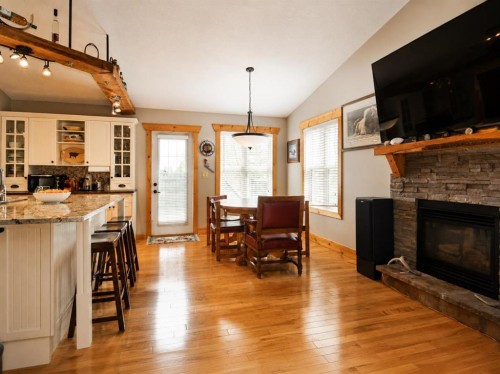 14-71332 Range Road 262, Ridgevalley, AB - Indoor With Fireplace