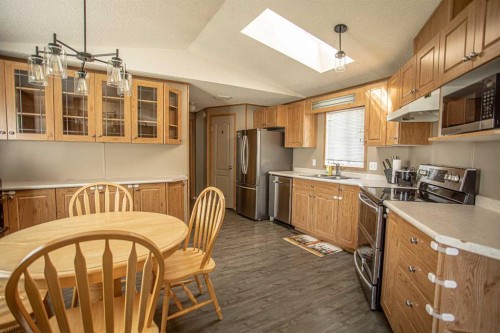 11 Deer Ridge Drive, High Level, AB - Indoor Photo Showing Kitchen With Double Sink