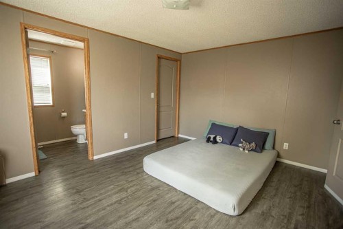 11 Deer Ridge Drive, High Level, AB - Indoor Photo Showing Bedroom