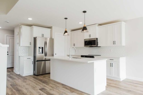 9522 114 Avenue, Clairmont, AB - Indoor Photo Showing Kitchen With Stainless Steel Kitchen With Upgraded Kitchen