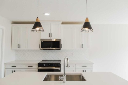 9522 114 Avenue, Clairmont, AB - Indoor Photo Showing Kitchen With Double Sink