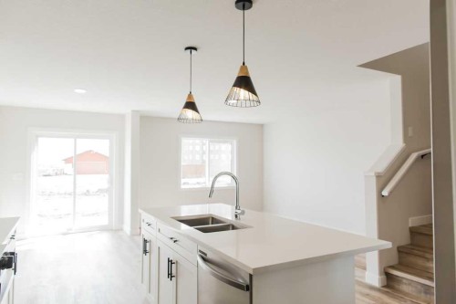 9520 114 Avenue, Clairmont, AB - Indoor Photo Showing Kitchen With Double Sink With Upgraded Kitchen
