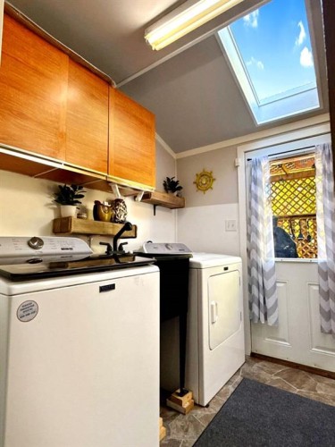 11002 Hoppe Avenue, Grande Cache, AB - Indoor Photo Showing Laundry Room