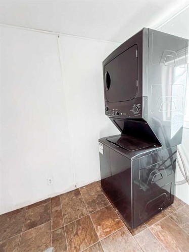 30010B 765 Township, Peoria, AB - Indoor Photo Showing Laundry Room