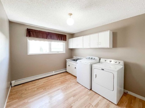 107 4 Avenue Sw, Falher, AB - Indoor Photo Showing Laundry Room