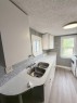 10030 102 Street, Peace River, AB  - Indoor Photo Showing Kitchen With Double Sink 
