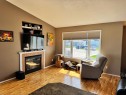 11345 110 Avenue Crescent, Fairview, AB  - Indoor Photo Showing Living Room With Fireplace 
