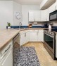 207-160 Moberly Road, Grande Cache, AB  - Indoor Photo Showing Kitchen With Double Sink 