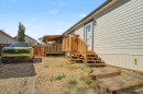 9530 112 Avenue, Clairmont, AB  - Outdoor With Deck Patio Veranda With Exterior 