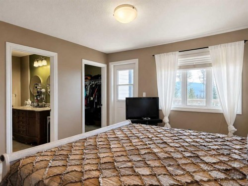 114 Moberly Road, Grande Cache, AB - Indoor Photo Showing Bedroom