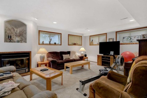 710 8Th Avenue West, Beaverlodge, AB - Indoor Photo Showing Living Room With Fireplace