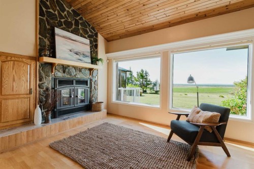 80057 712 Township, Wembley, AB - Indoor Photo Showing Other Room With Fireplace