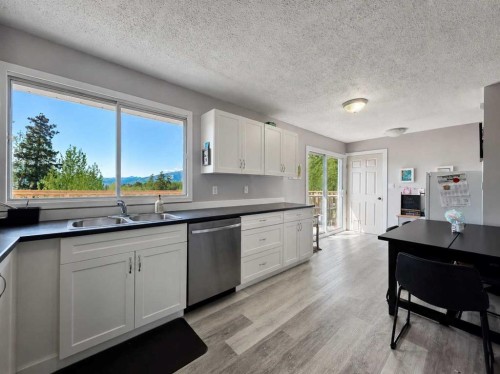 10638 Shand Avenue, Grande Cache, AB - Indoor Photo Showing Kitchen With Double Sink