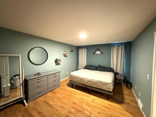 806 Cherry Crescent, Beaverlodge, AB - Indoor Photo Showing Bedroom
