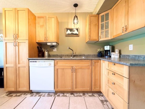 53 97 Avenue, Grande Cache, AB - Indoor Photo Showing Kitchen With Double Sink