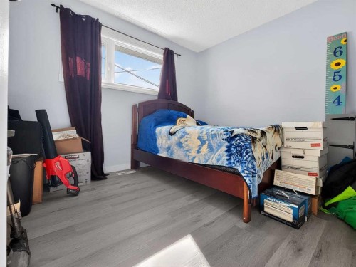 9704 94 Avenue, Wembley, AB - Indoor Photo Showing Bedroom