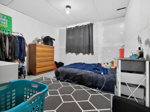 9704 94 Avenue, Wembley, AB - Indoor Photo Showing Bedroom