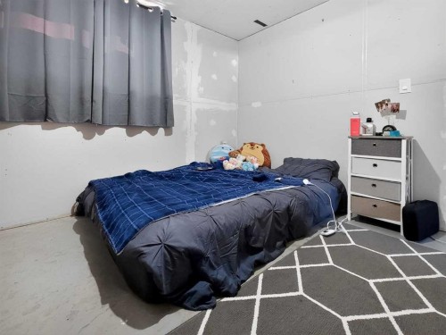 9704 94 Avenue, Wembley, AB - Indoor Photo Showing Bedroom