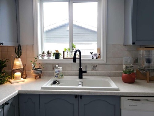 10213 106 Avenue, Fairview, AB - Indoor Photo Showing Kitchen With Double Sink