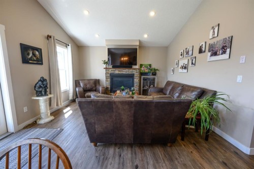 9211 95 Avenue, Wembley, AB - Indoor Photo Showing Living Room With Fireplace