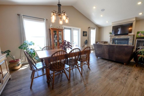 9211 95 Avenue, Wembley, AB - Indoor Photo Showing Dining Room With Fireplace