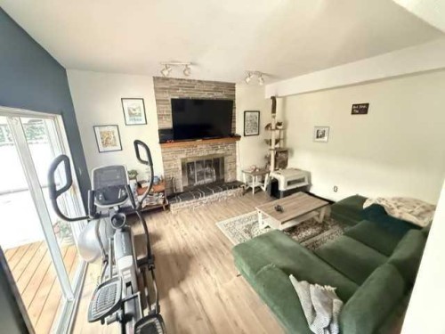 8801 101 Avenue, Peace River, AB - Indoor With Fireplace