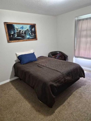 721023 Range Road 113, Beaverlodge, AB - Indoor Photo Showing Bedroom