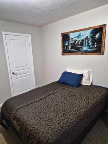 721023 Range Road 113, Beaverlodge, AB - Indoor Photo Showing Bedroom