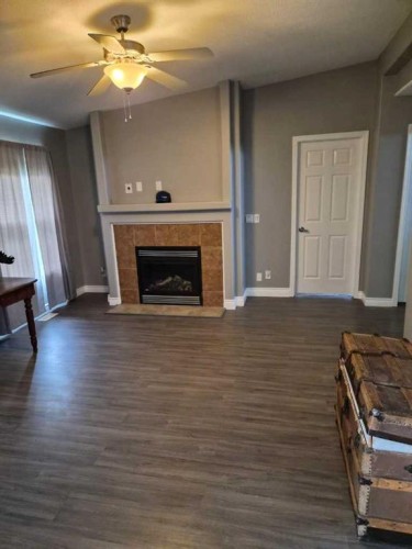 721023 Range Road 113, Beaverlodge, AB - Indoor Photo Showing Living Room With Fireplace