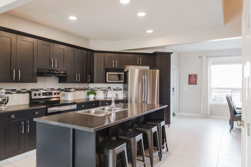 8852 96 Avenue, Grande Prairie, AB - Indoor Photo Showing Kitchen With Double Sink With Upgraded Kitchen