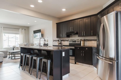8852 96 Avenue, Grande Prairie, AB - Indoor Photo Showing Kitchen With Upgraded Kitchen