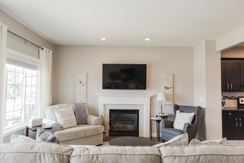8852 96 Avenue, Grande Prairie, AB - Indoor Photo Showing Living Room With Fireplace