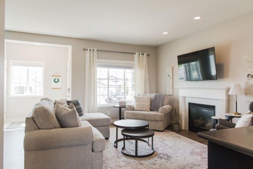 8852 96 Avenue, Grande Prairie, AB - Indoor Photo Showing Living Room With Fireplace