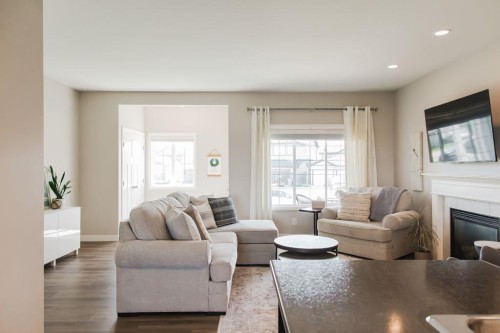 8852 96 Avenue, Grande Prairie, AB - Indoor Photo Showing Living Room With Fireplace