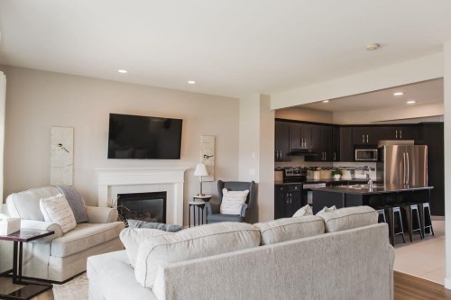 8852 96 Avenue, Grande Prairie, AB - Indoor Photo Showing Living Room With Fireplace