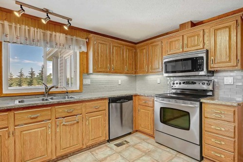743073 Highway 2, Sexsmith, AB - Indoor Photo Showing Kitchen With Double Sink
