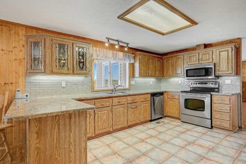 743073 Highway 2, Sexsmith, AB - Indoor Photo Showing Kitchen With Double Sink