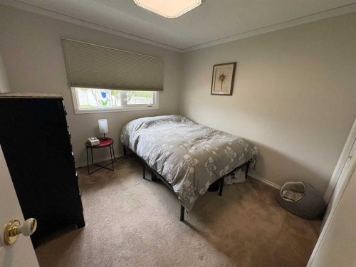 9610 79 Avenue, Peace River, AB - Indoor Photo Showing Bedroom